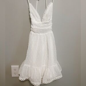 lucy in the sky white dotted mini dress! 🤍